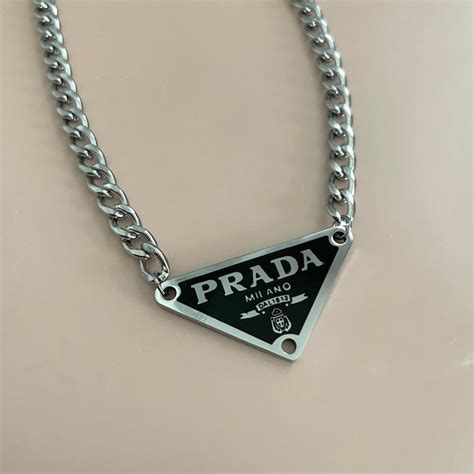 prada triangle print|prada triangle necklace.